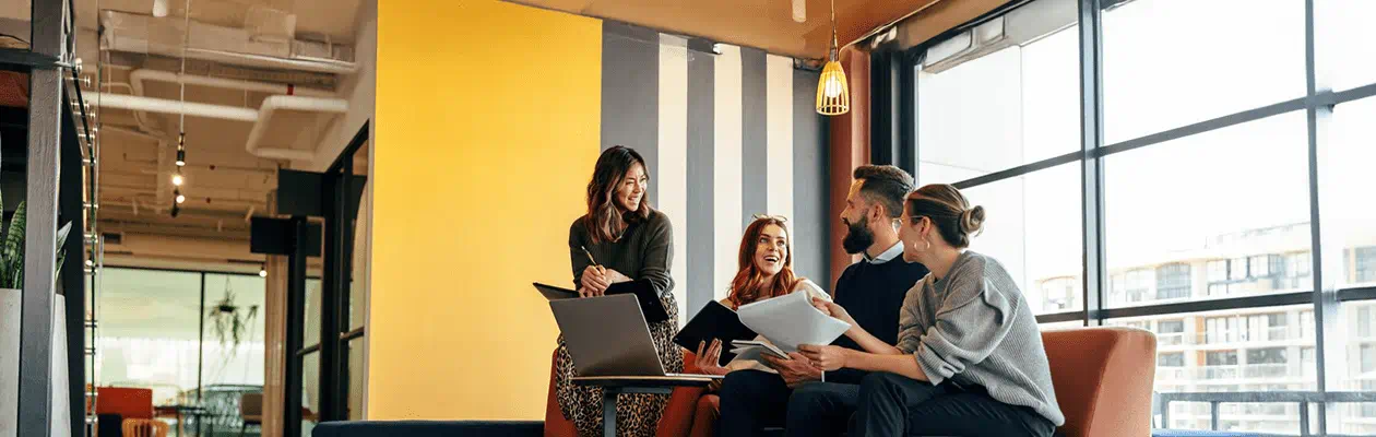 Impact of AI on Job Market - A group of people in an office Impact of AI on Job Market - A group of people in an office