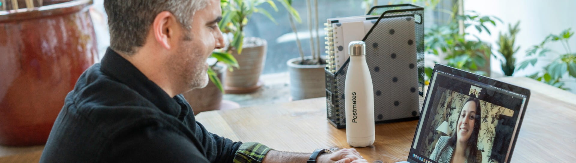 BANNER IMAGE - Man on remote team takes Zoom call