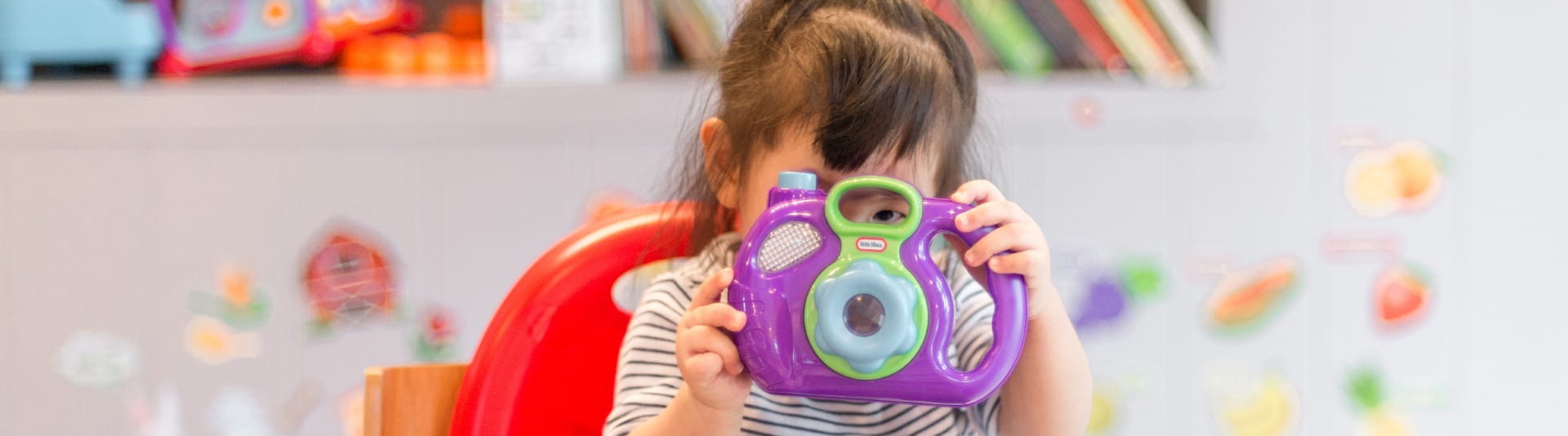 BANNER IMAGE - TOp 5 Dec 17 Child holding Camera