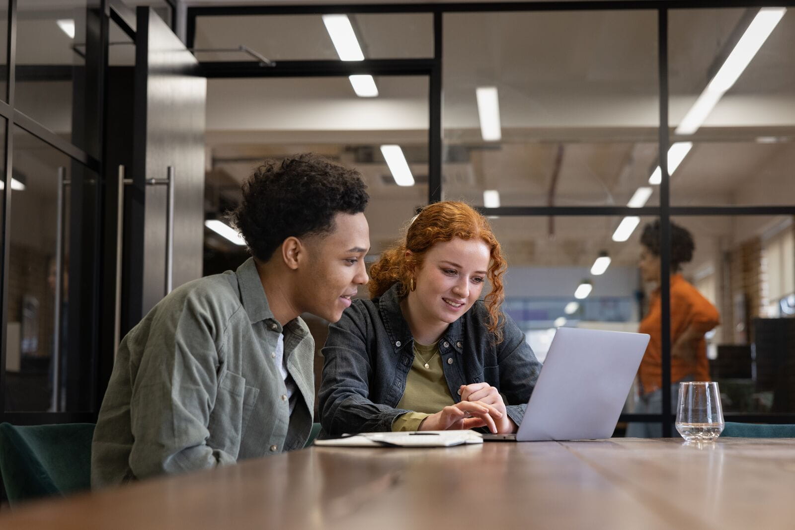 Students Working Together on Laptop looking for entry level jobs