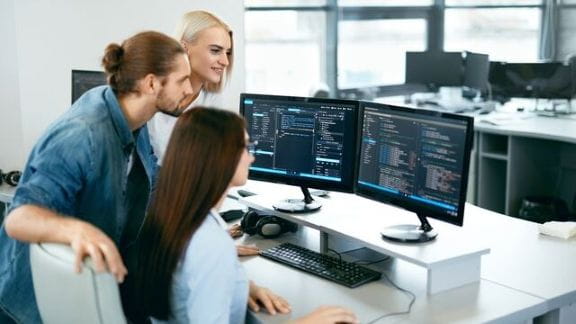 IT specialists work in a modern digital work environment. IT specialists work in a modern digital work environment.